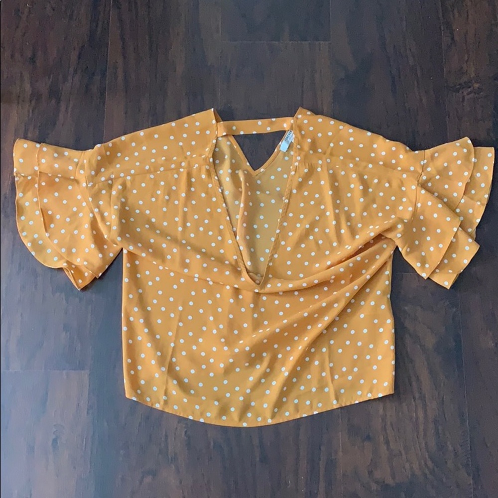 Orange polkadot shirt